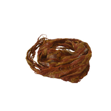 Load image into Gallery viewer, luxurious merino wool and tussah silk scarf in a rust and patina color coiled up with a white background
