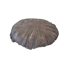 Load image into Gallery viewer, Bottom view of round artisan floor meditation cushion hand felted with a soft merino wool into silk fabric rose colors dominate however there is hints of burgundy, purple, mint green, green yellow and cream colors.

